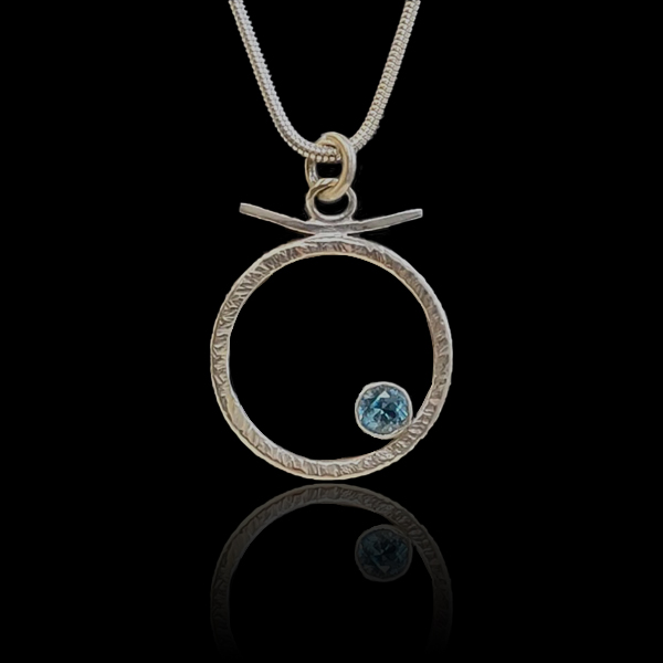 Hammered Circle Pendant Necklace With Blue Topaz