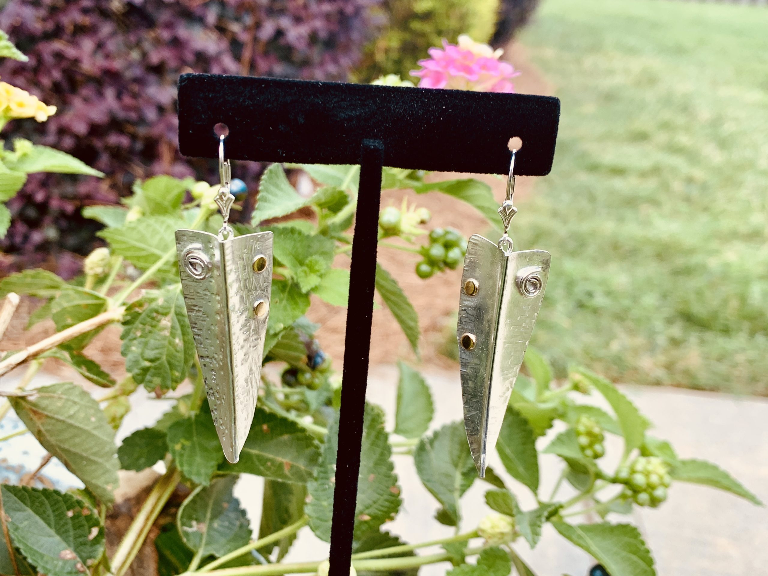 Arrow-inspired sterling silver earrings with 14k gold