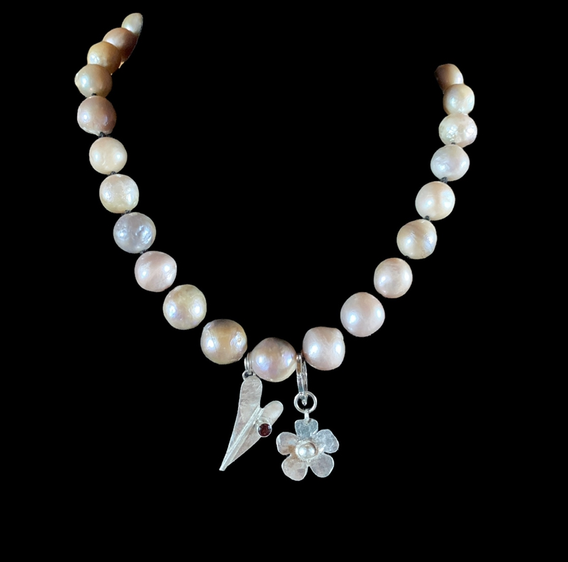 Freshwater pearl and sterling silver charm necklace